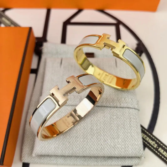 H - ARMBAND